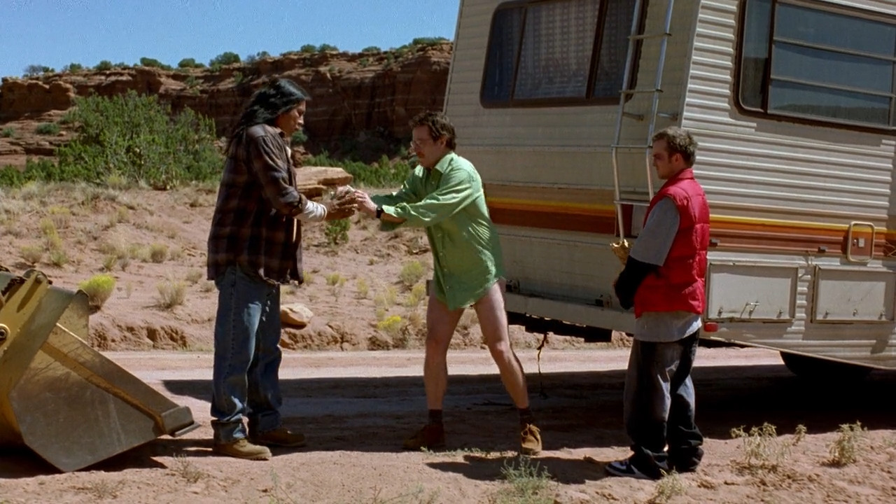 Walt gives a man chemical-covered money