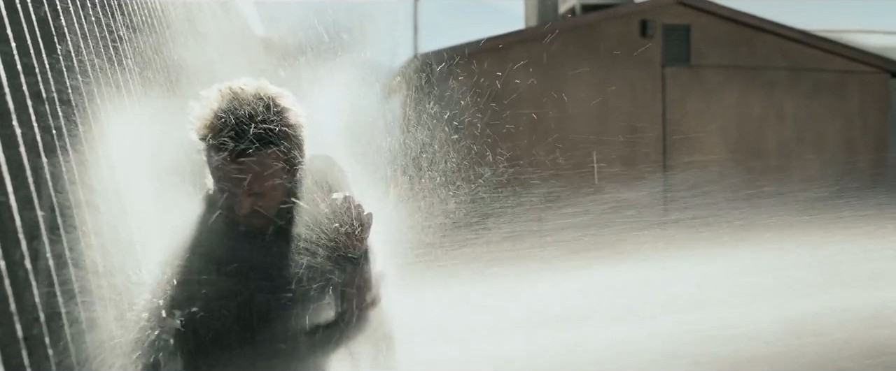 Jesse is sprayed down by Jack's gang